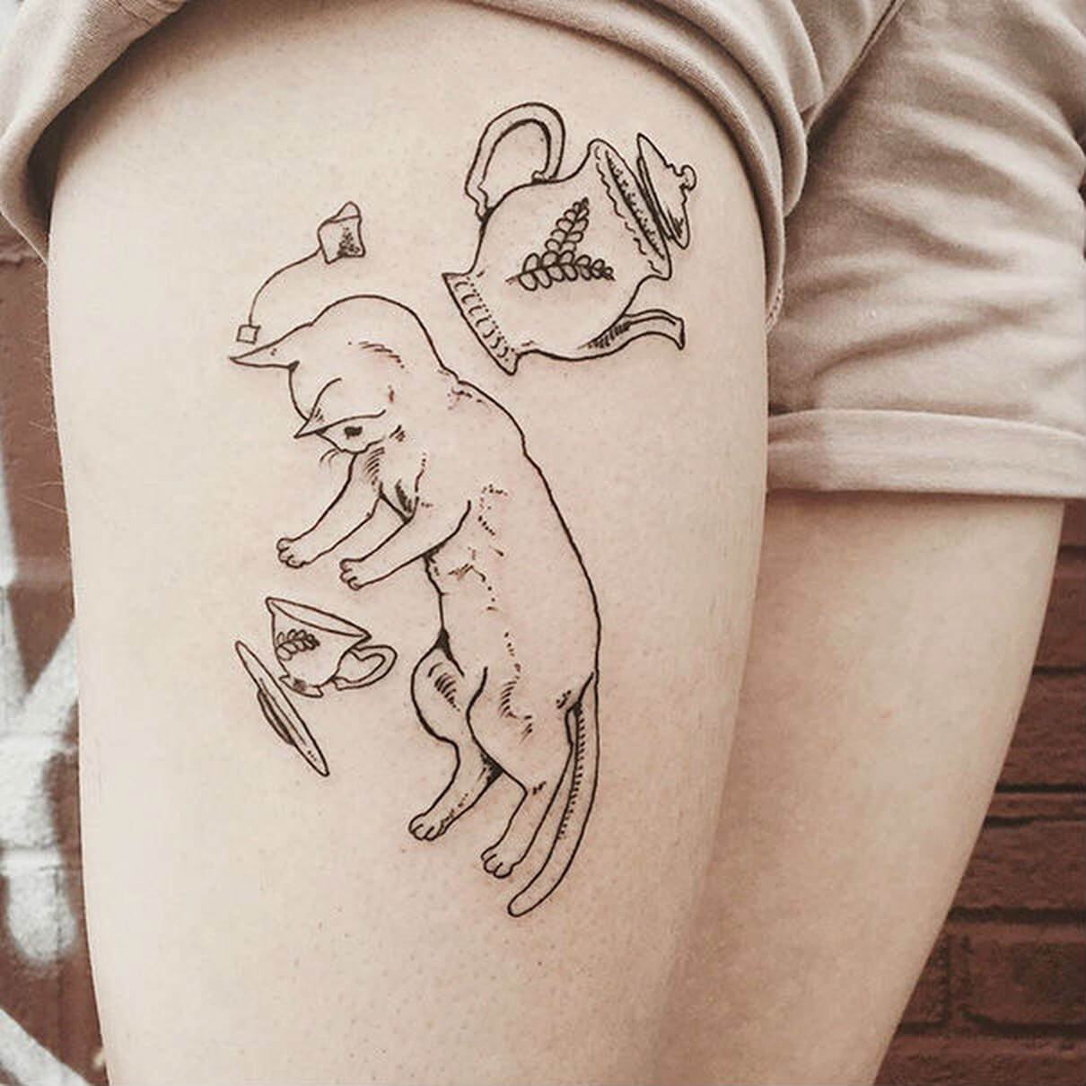 Татуировки хендпоук кот